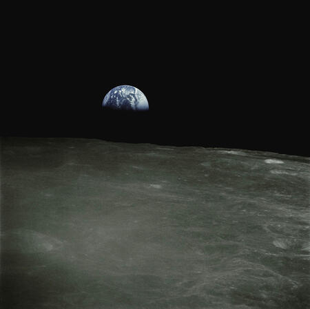 Earthrise—the rising Earth greeted the Apollo 8 astronauts on December 24, 1968 as they came from behind the Moon after the fourth nearside orbit